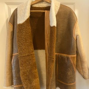 Reversible fur/leather jacket